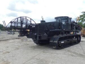 BRON 585 utility tractor with large equipment frame, designed for complex cable laying and pipeline installations, parked on a concrete lot.